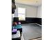 Multi-purpose room with padded flooring, a seating area, and bright window view at 520 Gatewood Dr, Greenwood, IN 46143