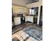 Well-lit kitchen with stainless steel appliances, white cabinetry, and modern finishes, perfect for cooking and entertaining at 520 Gatewood Dr, Greenwood, IN 46143