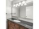 Classic bathroom vanity with a granite countertop and undermount sink at 5465 Leone Dr, Indianapolis, IN 46226