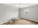 This bedroom has a ceiling fan and a window at 5465 Leone Dr, Indianapolis, IN 46226