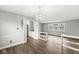 Dining area with wood-look floors and access to the pantry at 5465 Leone Dr, Indianapolis, IN 46226