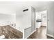 Inviting living room with wood-look floors and open access to the kitchen at 5465 Leone Dr, Indianapolis, IN 46226