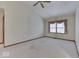 A bright bedroom with large windows, neutral carpeting, and a serene atmosphere at 613 Brook Dr, Greenwood, IN 46143