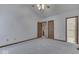 A bright bedroom with a vaulted ceiling has an ensuite bath and closet at 613 Brook Dr, Greenwood, IN 46143