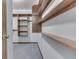 The walk-in closet has custom shelving for storage at 613 Brook Dr, Greenwood, IN 46143