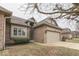 Lovely single-Gathering home with a well-kept lawn and a convenient two-car garage at 613 Brook Dr, Greenwood, IN 46143