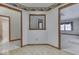 Hallway with access to bathroom, other rooms, with fruit-themed wallpaper at 613 Brook Dr, Greenwood, IN 46143