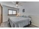 Relaxing bedroom featuring neutral tones, a ceiling fan, and a window at 6420 Oriole Dr, Nineveh, IN 46164