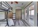 Bunkroom featuring a ceiling fan, closet, and french doors to the deck at 6420 Oriole Dr, Nineveh, IN 46164