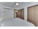 This is a bedroom with a comfortable bed, ceiling fan, and plenty of storage space at 6420 Oriole Dr, Nineveh, IN 46164