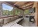 Comfortable deck with furniture and a view of the surrounding nature at 6420 Oriole Dr, Nineveh, IN 46164
