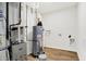 Utility room with water heater, furnace, and other mechanicals at 7161 Jackson Dr, Cumberland, IN 46229