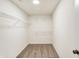 The walk-in closet is equipped with adjustable wire shelving, maximizing the storage space at 7161 Jackson Dr, Cumberland, IN 46229