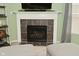 Cozy fireplace with tile surround, complemented by neutral decor and comfortable seating at 8317 S Swimming Hole Ln, Pendleton, IN 46064