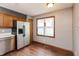 Efficient kitchen features stainless steel appliances, wood cabinets, and durable counter tops at 10156 Park Royale Dr, Indianapolis, IN 46229