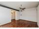 Spacious living room featuring wood floors and modern ceiling fan at 10156 Park Royale Dr, Indianapolis, IN 46229