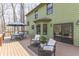 Spacious deck is perfect for outdoor dining and relaxing with serene views of the surrounding nature at 1032 E Woodall Ct, Martinsville, IN 46151