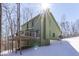 Another side of the back exterior, featuring a deck and house facade at 1032 E Woodall Ct, Martinsville, IN 46151