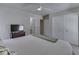 Comfortable bedroom with large closet for ample storage and a view of the backyard at 1032 E Woodall Ct, Martinsville, IN 46151