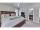 Inviting bedroom with ensuite bathroom with a view of the backyard at 1032 E Woodall Ct, Martinsville, IN 46151