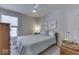 Well-lit bedroom features neutral tones and a cozy design at 1032 E Woodall Ct, Martinsville, IN 46151