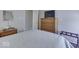 Bright bedroom featuring carpet, side tables and a view of an ensuite bathroom at 1032 E Woodall Ct, Martinsville, IN 46151