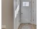 Entryway featuring a decorative rug and a view through the door at 1032 E Woodall Ct, Martinsville, IN 46151