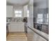 Updated kitchen featuring stainless steel appliances, granite counters, and tile backsplash at 1032 E Woodall Ct, Martinsville, IN 46151