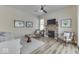 Living room with nice flooring, a fireplace, and natural light at 1032 E Woodall Ct, Martinsville, IN 46151