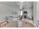 Spacious living room with a fireplace, stylish decor, and lots of natural light at 1032 E Woodall Ct, Martinsville, IN 46151