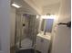 Bathroom featuring a glass-enclosed shower, modern vanity, and neutral color scheme, ideal for a modern feel at 1038 W 33Rd St, Indianapolis, IN 46208