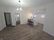 Open dining area with breakfast bar and modern pendant lighting for an inviting atmosphere at 1038 W 33Rd St, Indianapolis, IN 46208