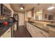 Well-lit kitchen features modern appliances and sleek countertops at 1057 Timber Creek Dr # 1, Carmel, IN 46032
