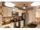 Bright kitchen featuring stainless steel appliances and ample counter space at 1057 Timber Creek Dr # 1, Carmel, IN 46032