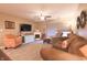 Cozy living room featuring a fireplace and comfortable furnishings at 1057 Timber Creek Dr # 1, Carmel, IN 46032