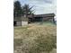 A spacious backyard featuring a deck, swing set, slide and gazebo perfect for outdoor fun at 1130 W State Road 42, Mooresville, IN 46158
