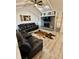 Spacious living room with vaulted ceiling, modern fan, fireplace, and stylish decor at 1130 W State Road 42, Mooresville, IN 46158