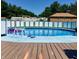 Inviting above-ground pool surrounded by deck area, perfect for summer relaxation at 1130 W State Road 42, Mooresville, IN 46158