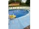 Refreshing above-ground pool with playful duck float and ladder offers summer fun at 1130 W State Road 42, Mooresville, IN 46158