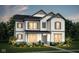 Charming two-story home featuring white siding, gray shutters, and a well-manicured lawn at 14447 Bishop Birch Pl, Carmel, IN 46032
