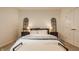 Bedroom with a large bed, matching nightstands, and a bench at the foot of the bed at 15432 Heatherbank Dr, Westfield, IN 46074