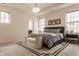 Bright main bedroom with natural light, modern decor, and a comfortable king-sized bed at 15432 Heatherbank Dr, Westfield, IN 46074