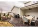 Covered patio area with a ceiling fan, outdoor furniture and dining area at 15432 Heatherbank Dr, Westfield, IN 46074