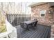 Cozy back deck with outdoor dining set, ideal for enjoying meals and gatherings at 15921 Herriman Blvd, Noblesville, IN 46060