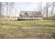 Lush backyard features a spacious deck, perfect for outdoor dining and entertaining guests at 15921 Herriman Blvd, Noblesville, IN 46060