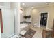 Luxurious bathroom with a soaking tub, walk-in shower, and access to walk-in closet at 15921 Herriman Blvd, Noblesville, IN 46060