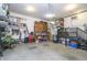 Organized garage with shelving, storage, and a variety of equipment at 15921 Herriman Blvd, Noblesville, IN 46060