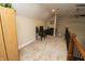 Open loft area with black desk and office supplies and overlooks the living room at 15921 Herriman Blvd, Noblesville, IN 46060