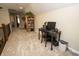 Open loft area with desk, carpeting and access to multiple rooms at 15921 Herriman Blvd, Noblesville, IN 46060