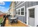 Back deck features a round table and chairs, perfect for outdoor dining or relaxing at 16057 Coleman Dr, Westfield, IN 46074